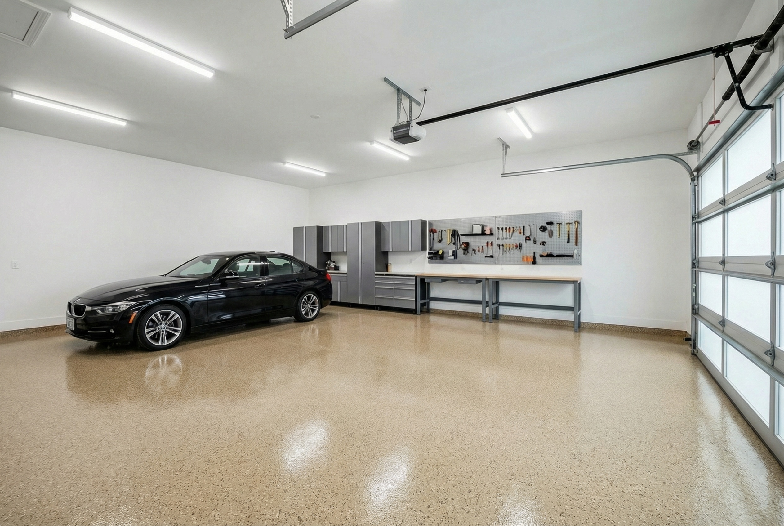 Garage floor visualization with a warm Penntek Sandstone broadcast finish
