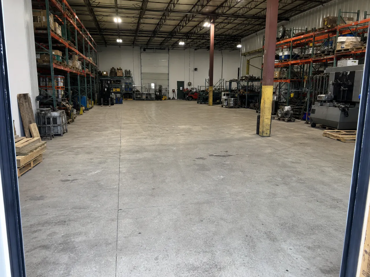Existing unfinished concrete floor in an industrial warehouse