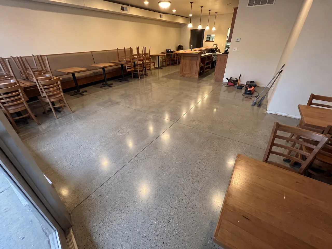 Polished concrete preview in a restaurant dining room